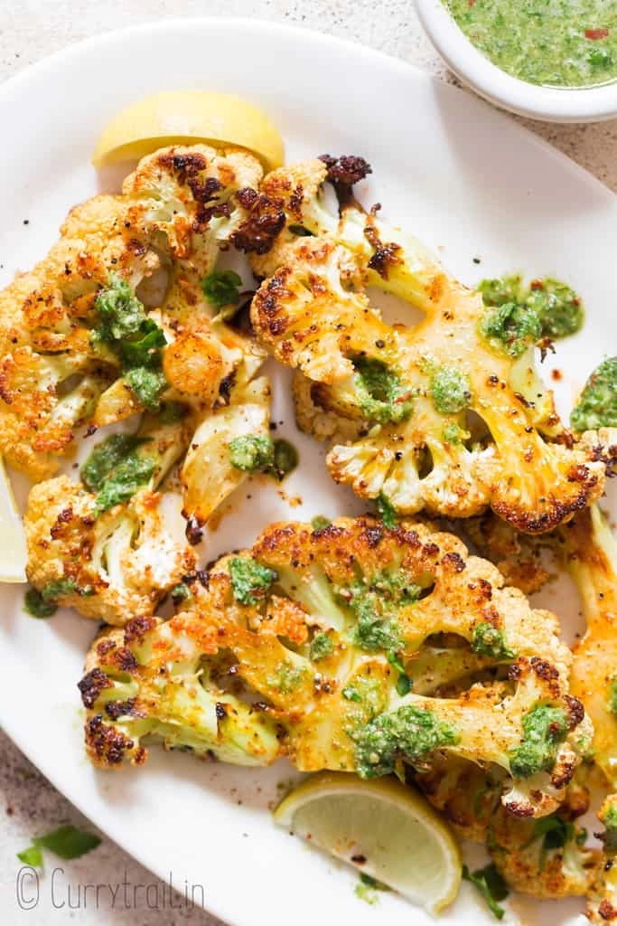 Cajun Roasted Cauliflower Steak Chimichurri And Olives-Scallion Crushed Potatoes (Ve)