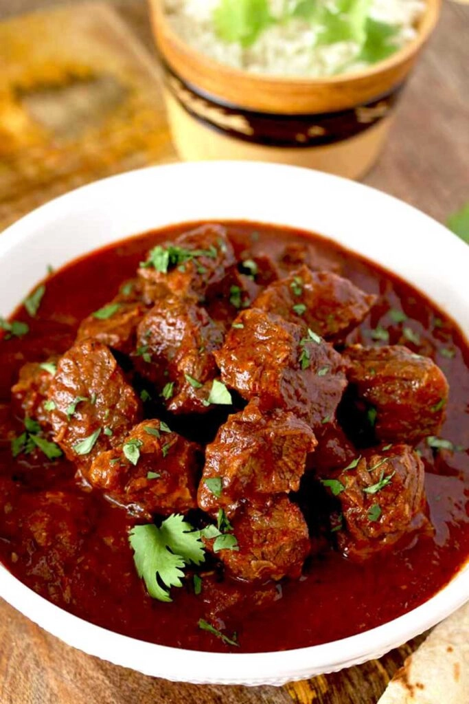 Red Stripe Beef Stew With Rice & Peas And Plantain