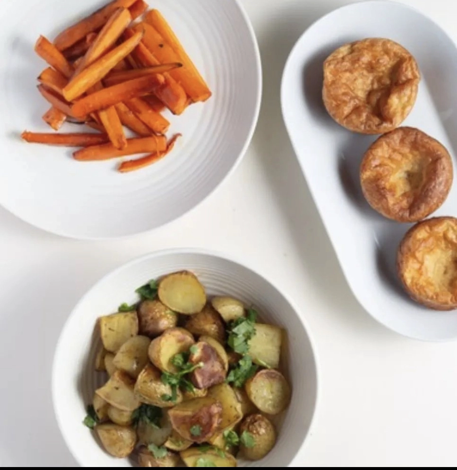 Pigs In Blankets, Sage & Onion Stuffing, Sautéed Sprouts & Chestnuts, Thyme Roast Potatoes, Honey Glazed Carrots & Gravy + Cranberry Sauce