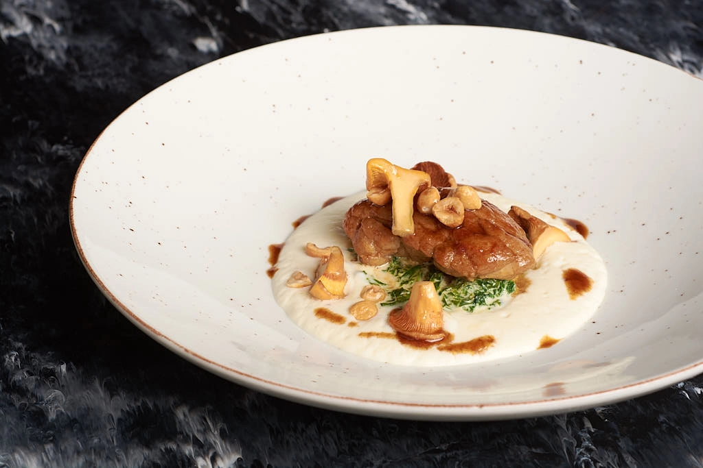 Roasted Sweetbread With Wild Mushrooms, Hazelnuts And Watercress