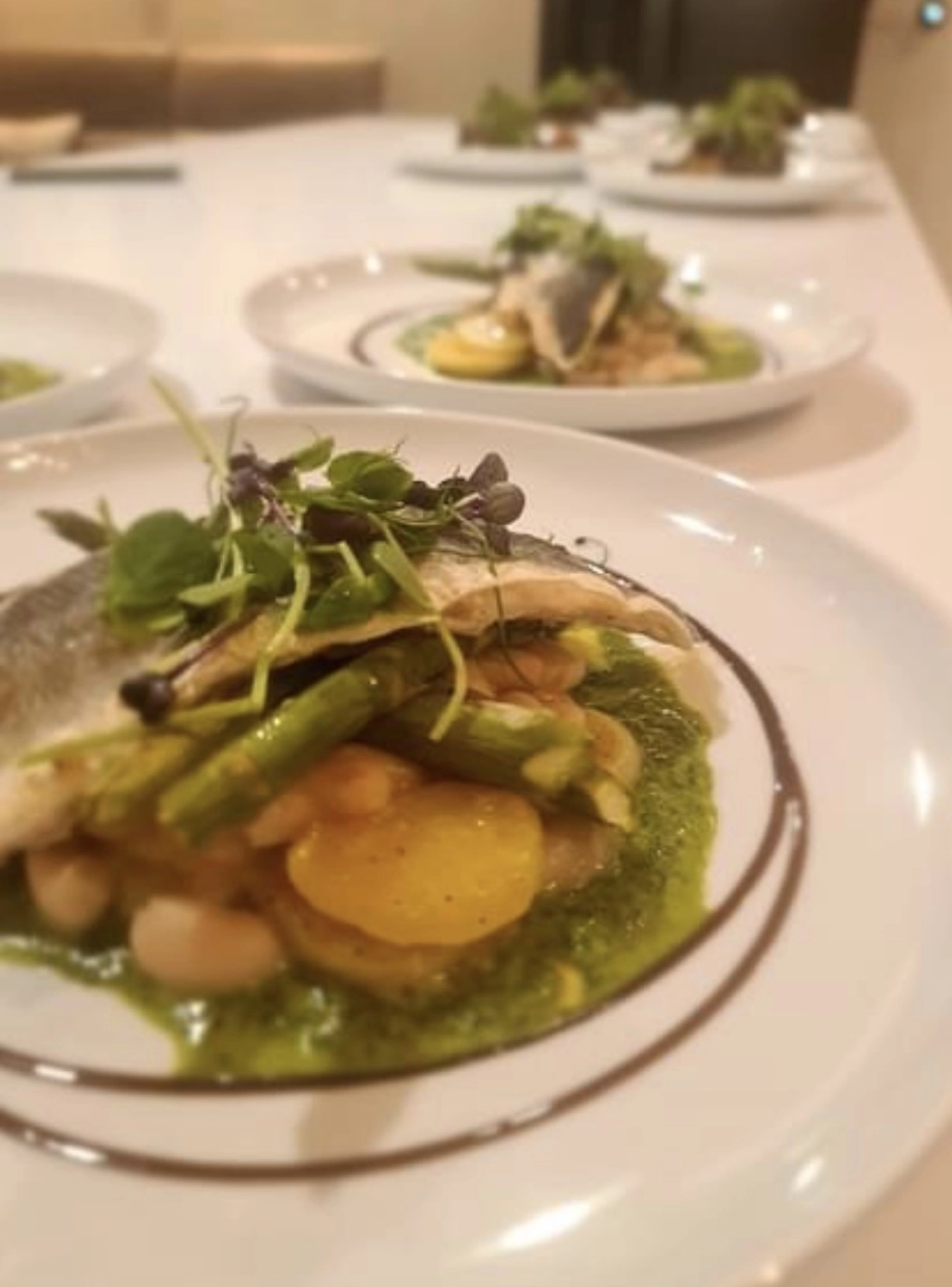 Pan-Seared Seabass & Cannellini Bean Reduction, Thyme Roast New Potatoes ,Pea & Mint Puree, Honey Glazed Carrots