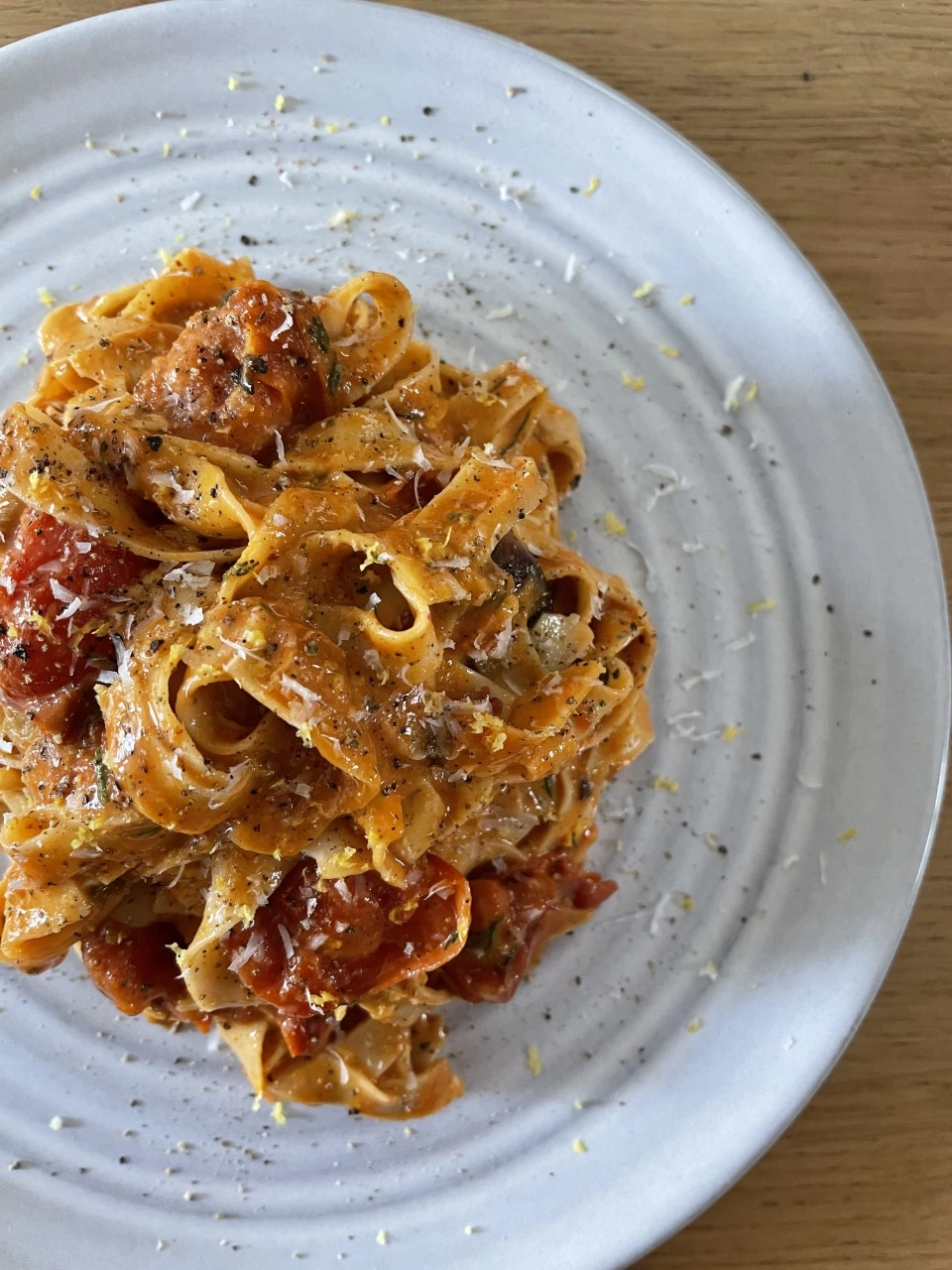 Tagliatelle Pasta, Sun-Dried Tomato And Vodka Sauce, Shaved Parmesan And Rocket Salad (V)