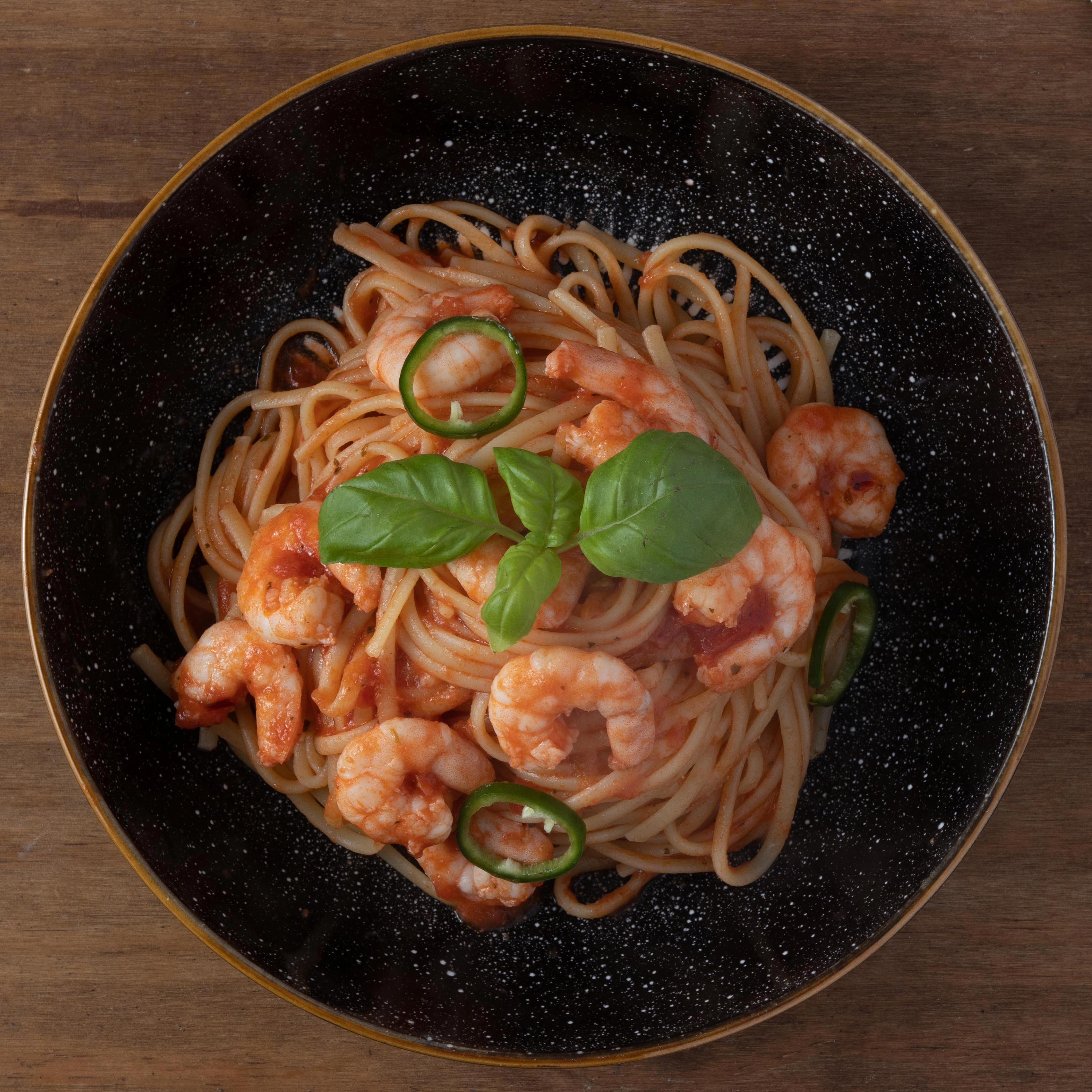 Spaghetti Con Gamberi- Cooked In Rich Tomato Sauce.