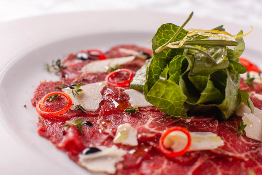 Fillet Of Beef Carpaccio & Organic Dipping Chilli, Garlic, Parsley And Olive Oil