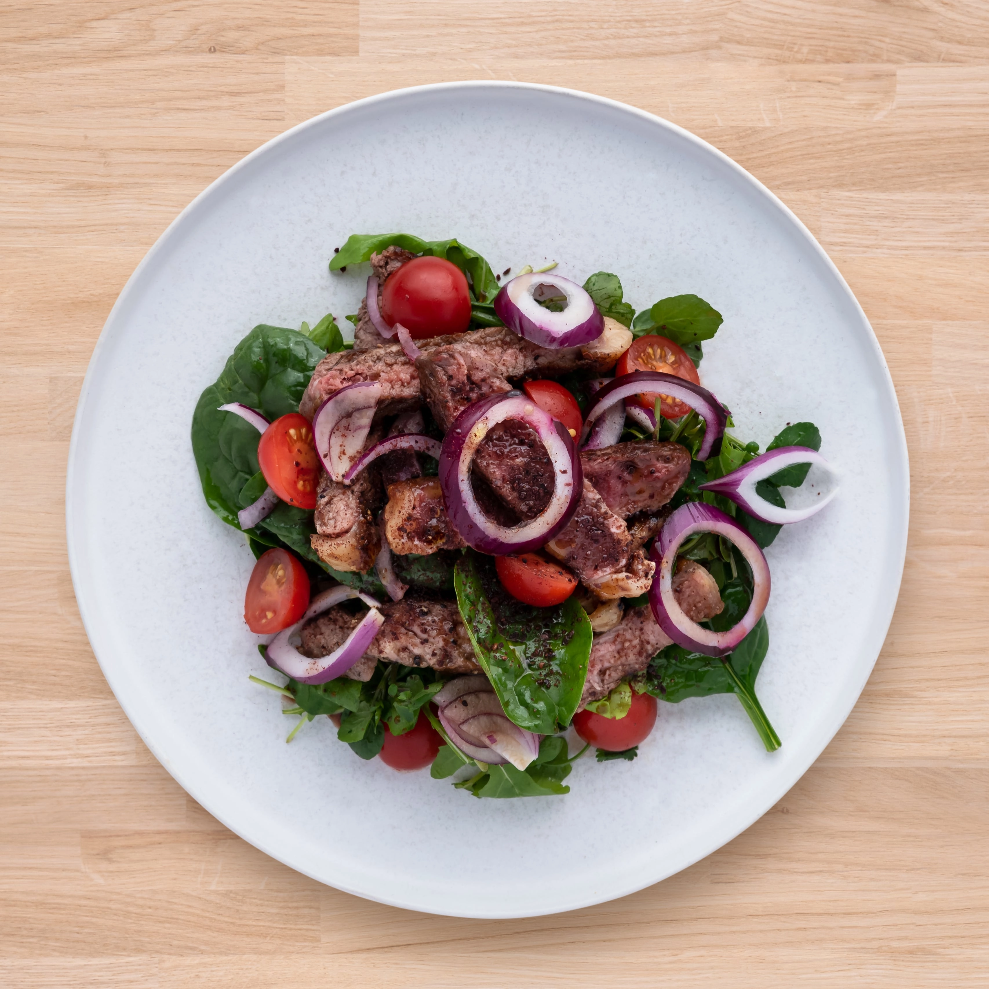 Seared Beef With Pomegranate & Balsamic Dressing