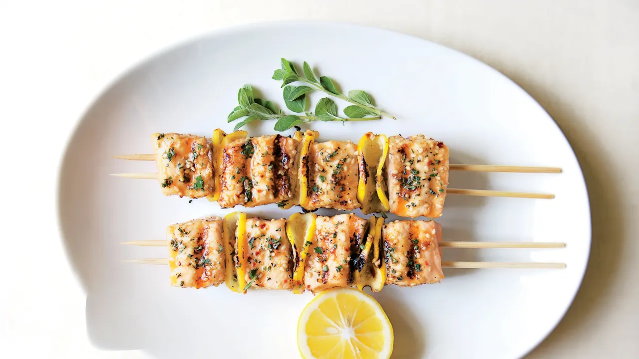 Salmon And Confit Leeks Kebab With Saffron And Champagne Sauce