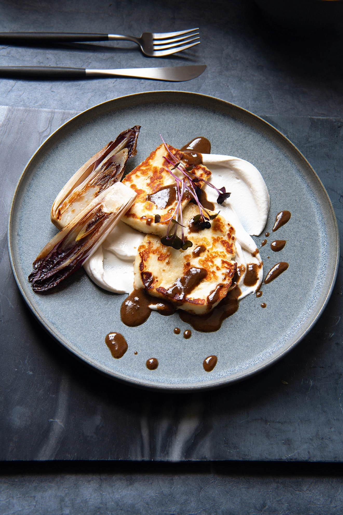 Seared Halloumi With Black Garlic Vinaigrette, Tahini Yoghurt And Grilled Red Chicory