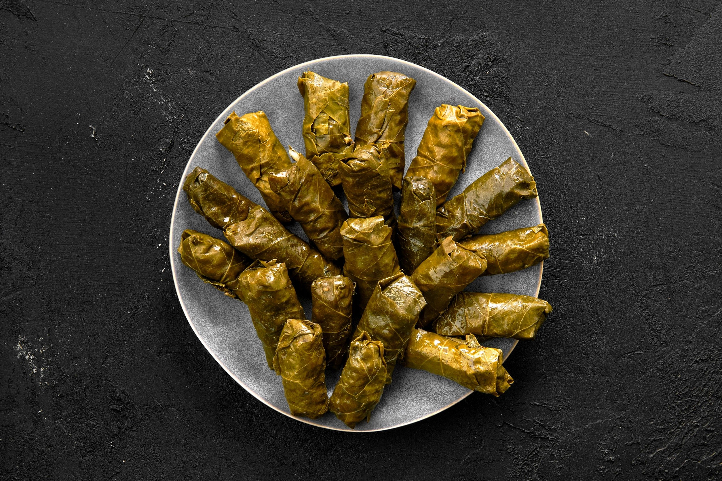 Warak Inab (Vegan). Vine Leaves Stuffed With Rice And Herbs, Slow Cooked Till Tender 