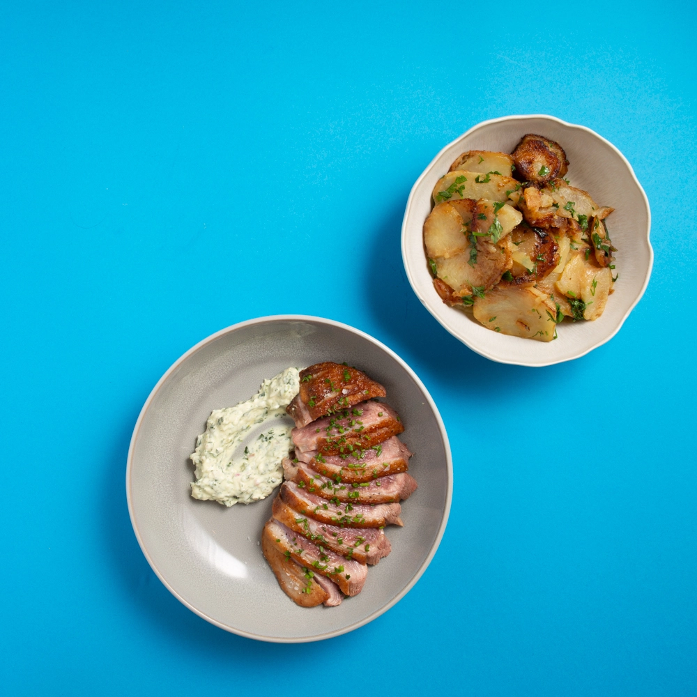 Duck Breast And Homemade Béarnaise Sauce Roasted Potatoes In Goose Fat With Garlic And Parsley