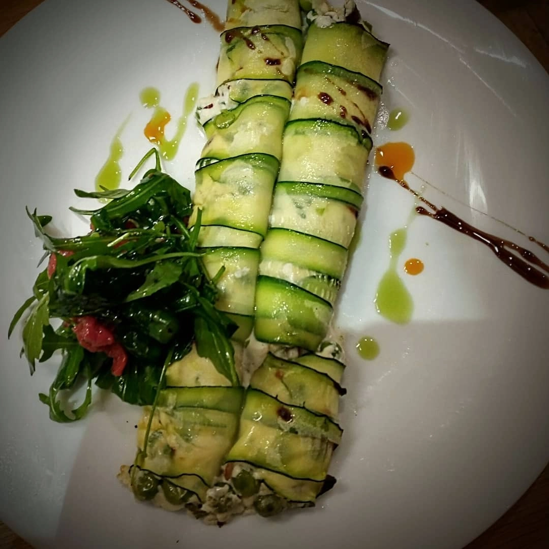 Courgette Cannelloni With Goat Cheese, Peas, Toasted Almonds And Seasonal Vegetables (V)