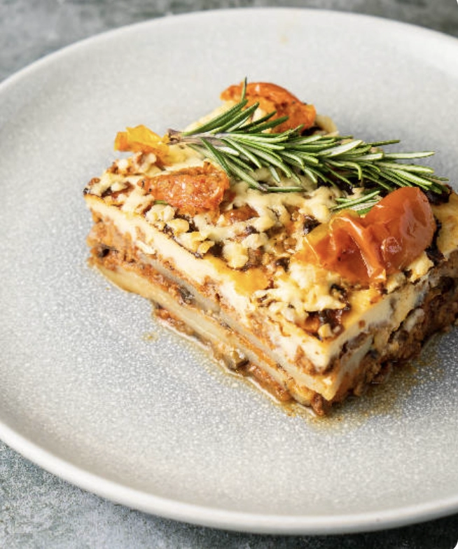 Award Winning Lamb Or Beef Moussaka Served With A Side Of Greek 'Horiatiki' Salad