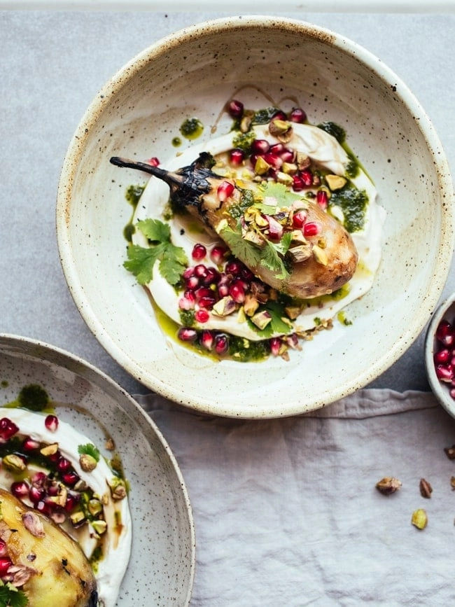 Smoked Aubergine, Served With Coriander Oil, Garlic Labneh And Pomegranate Seeds (Starter)