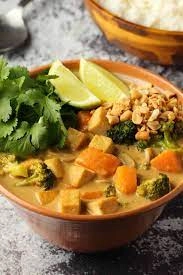 Vegan Massaman Curry With Tofu And Peanuts Served With Rice
