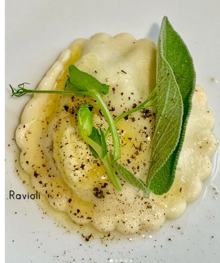 Homemade Ravioli - Filled Ricotta And Bacon Topped With Sage Butter 
