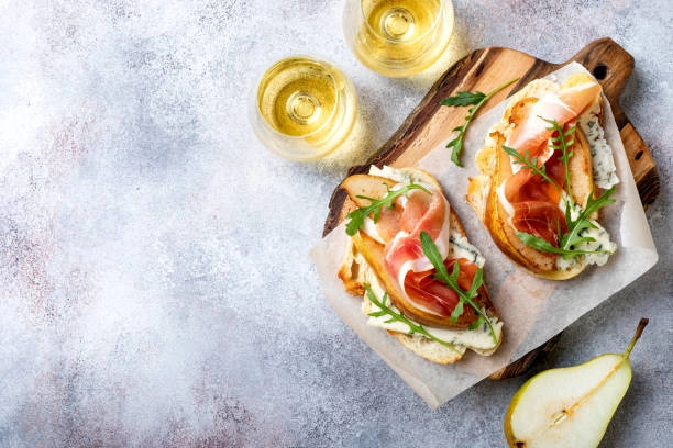 Mozzarella Drops Wrapped Parma Ham Bites On Ciabatta Bread Slice