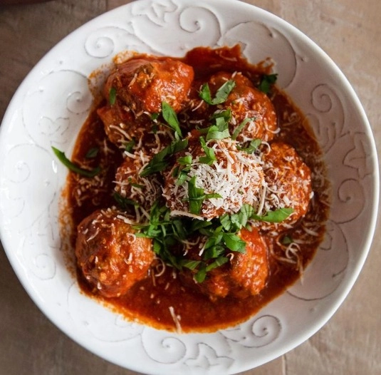 Beef Polpete (Mini Beef Meatballs) In Basil Arrabiata Sauce Served With Toasted Italian Bread