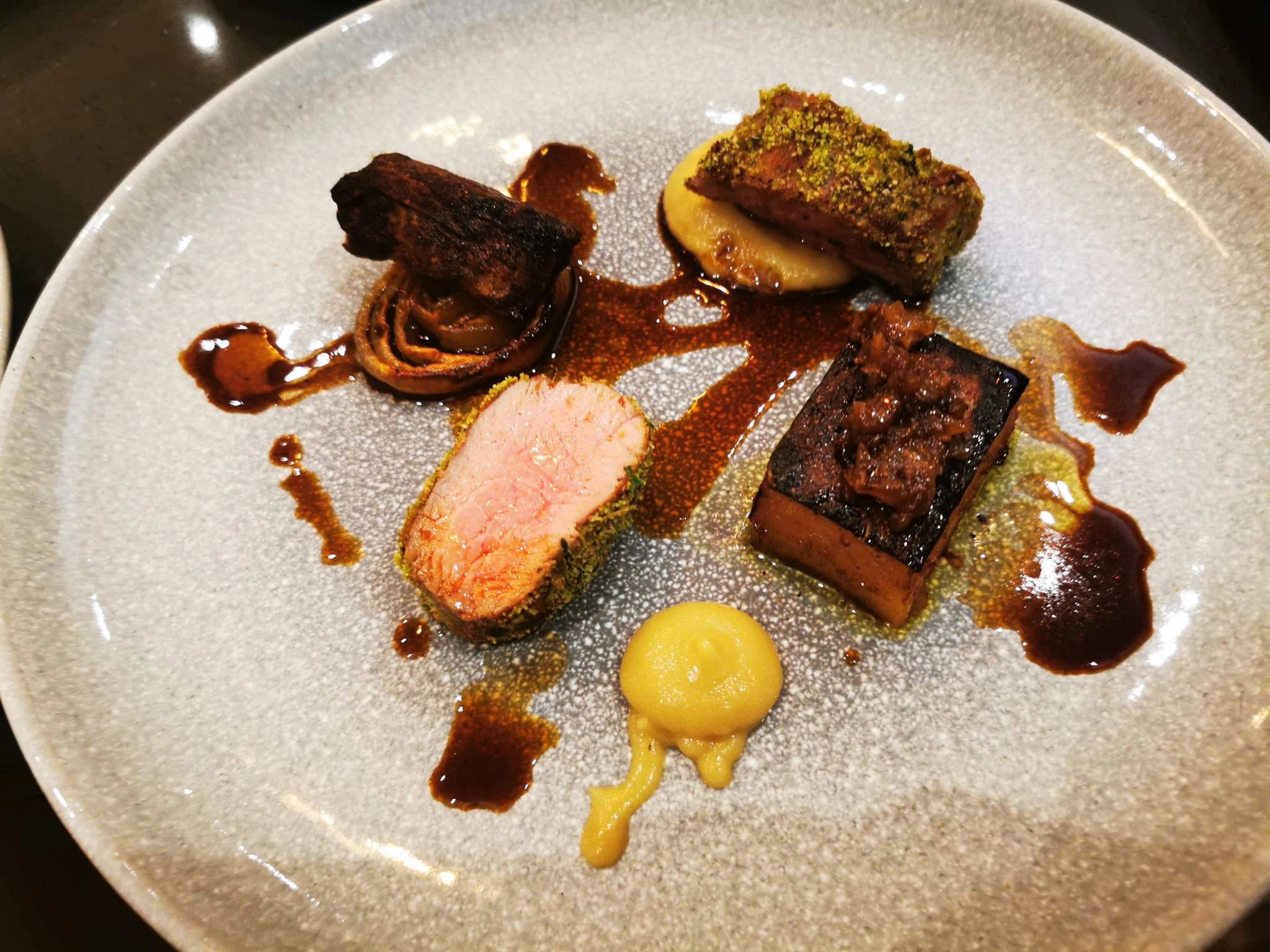 Herb Crusted Loin Of Lamb, Lamb Shoulder ‘Cigar’, Caramelised Onion Puree & Fondant Potato