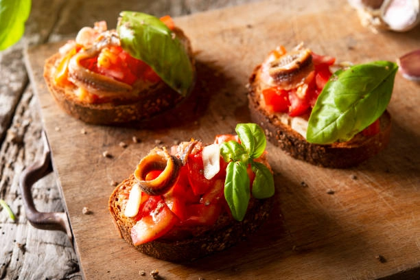 Roast Bell Pepper And Anchovy Bruschettini
