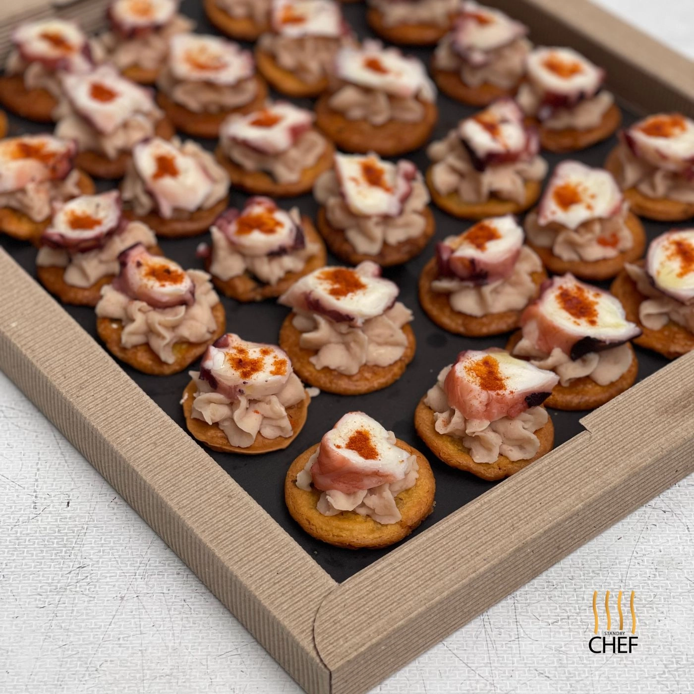 Octopus With Smoked Paprika And Maldon Flakes On Rosemary Cecina