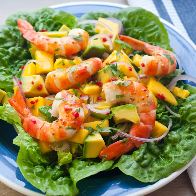 Tiger King Prawns Marinated With Chipotle Served With Avocado And Mango Salsa