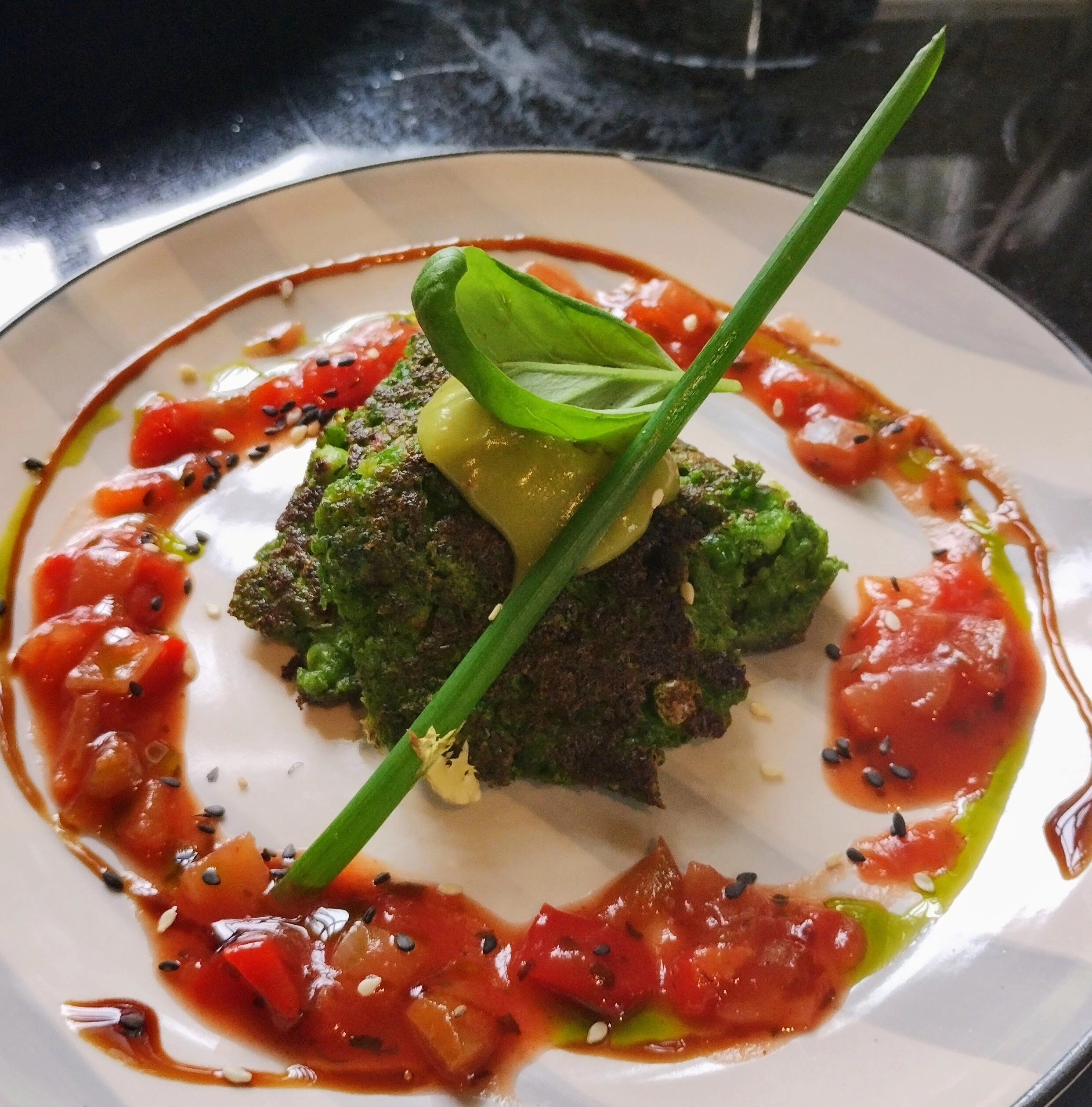 Pea & Mint Fritter, Spicy Tomato Salsa, Avocado Puree, Fresh Herbs Salad  (V)