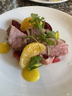 Pan Seared Duck Breast, Caramelised Plumbs, Orange Gel, Torched Orange Segments, Rocket