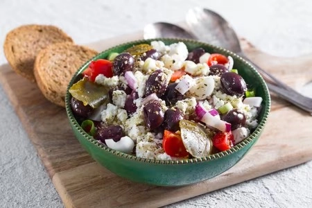 Italian Salad With Cherry Tomatoes, Mozzarella, Olives And Cucumbers
