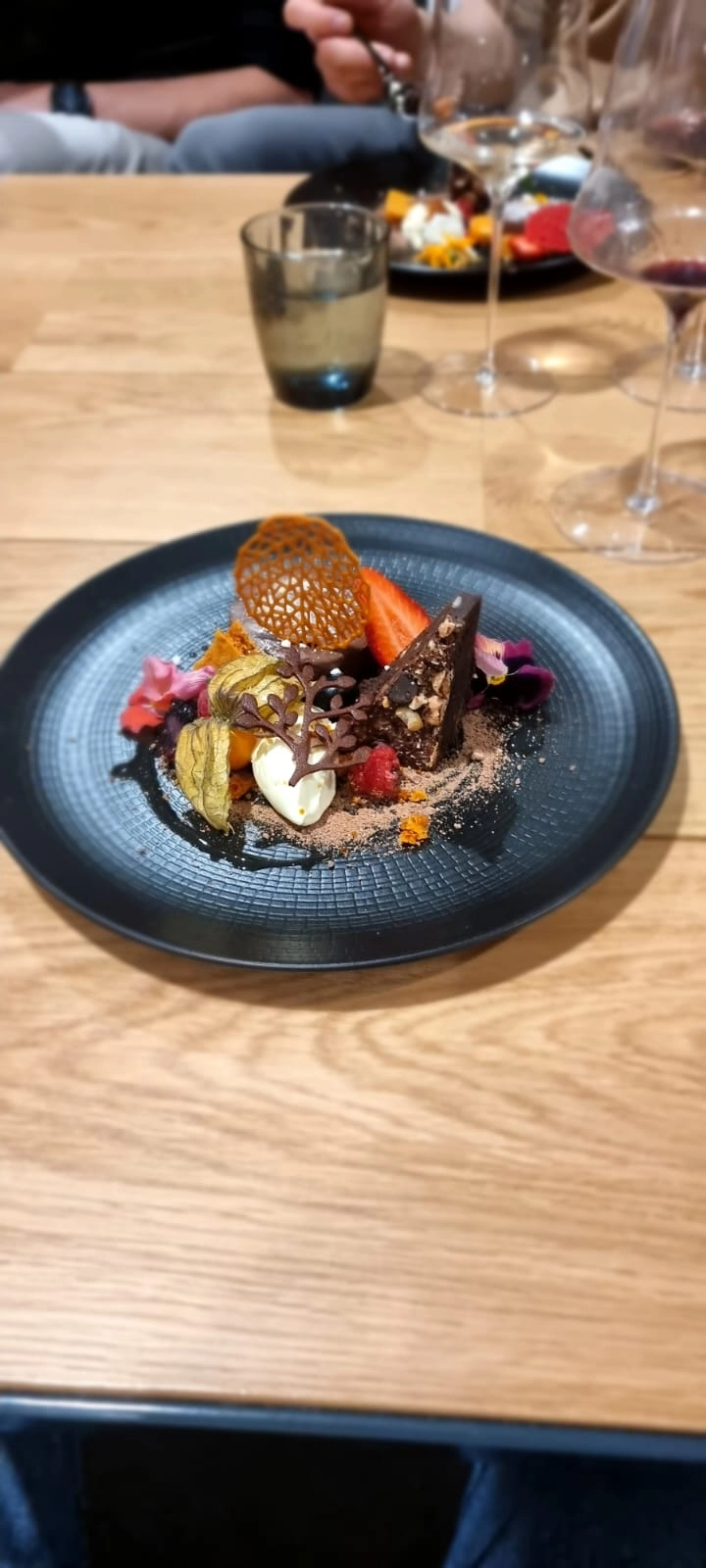 Assiette Of Chocolates Served With Berries Variation And Honeycomb  