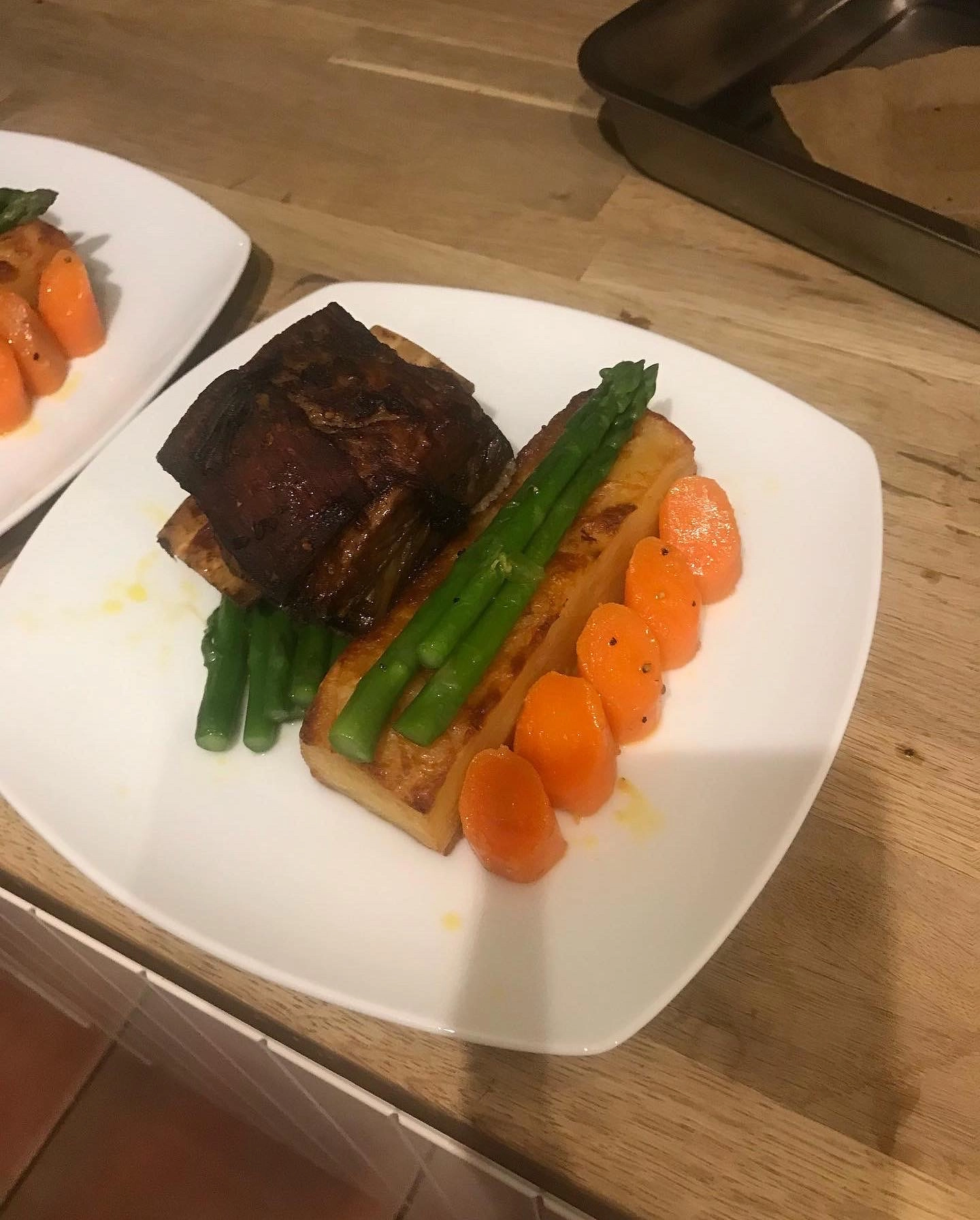 Slow Cooked Short Ribs /Potatoes Dauphnoises /Baby Carrots/ Saute Asparagus /Jus