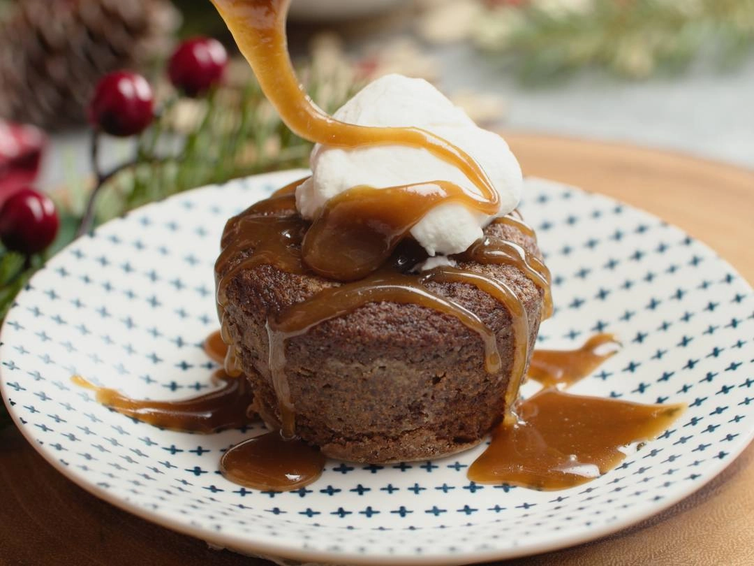 Warm Sticky Toffee Pudding With Toffee Sauce And Vanilla Ice Cream