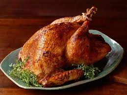 Roasted Turkey Served With A Rich Red Wine Gravy Sauce