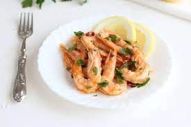 Prawns Sautéed In A Pan With Garlic And Parsley