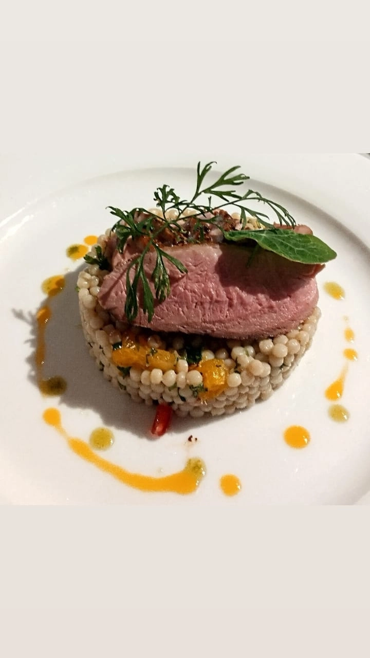 Duck Breast, Giant Couscous, Pomegranate, Orange Segments