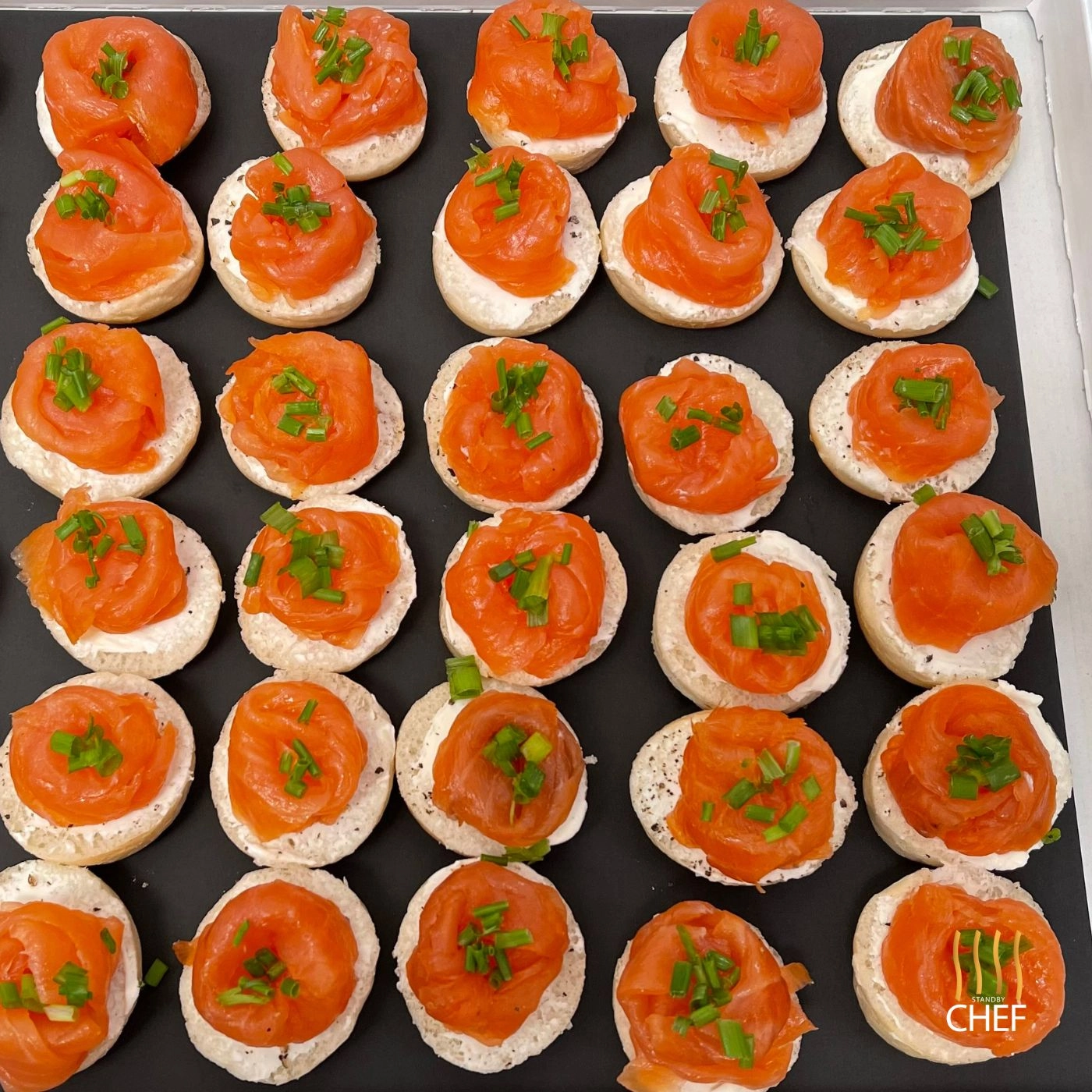 Roses Of Smoked Salmon On Mini Bagels, Cream Cheese And Chive