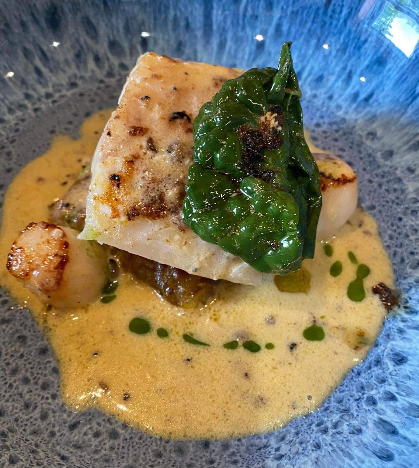 Poached Cod, Potato Rosti, Roasted Scallop, Cavolo Nero & Truffle Velouté
