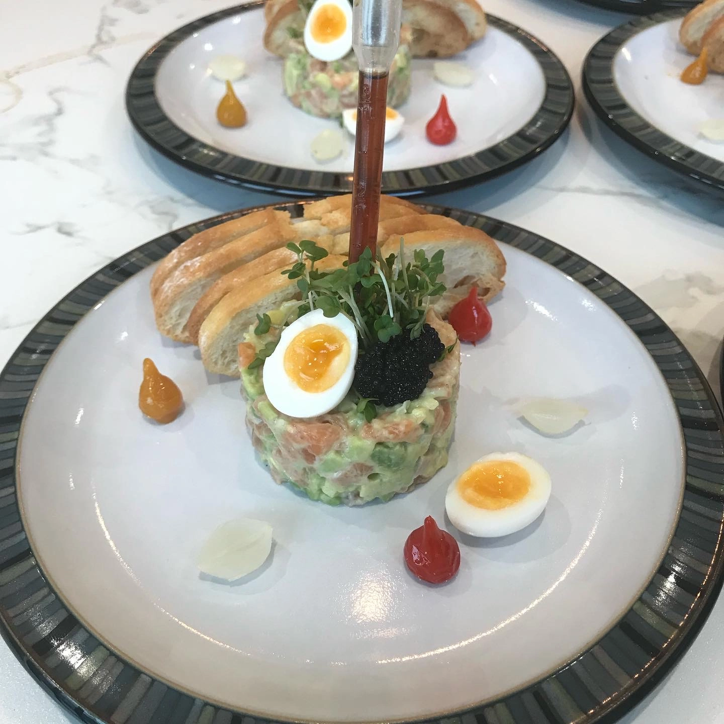 Marinated Salmon And Avocado Tartare/Quail Egg/Toast 