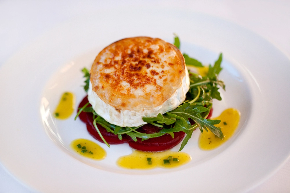 Golden Goat Cheese Bomb Coated With Almond Mango Puree (V)