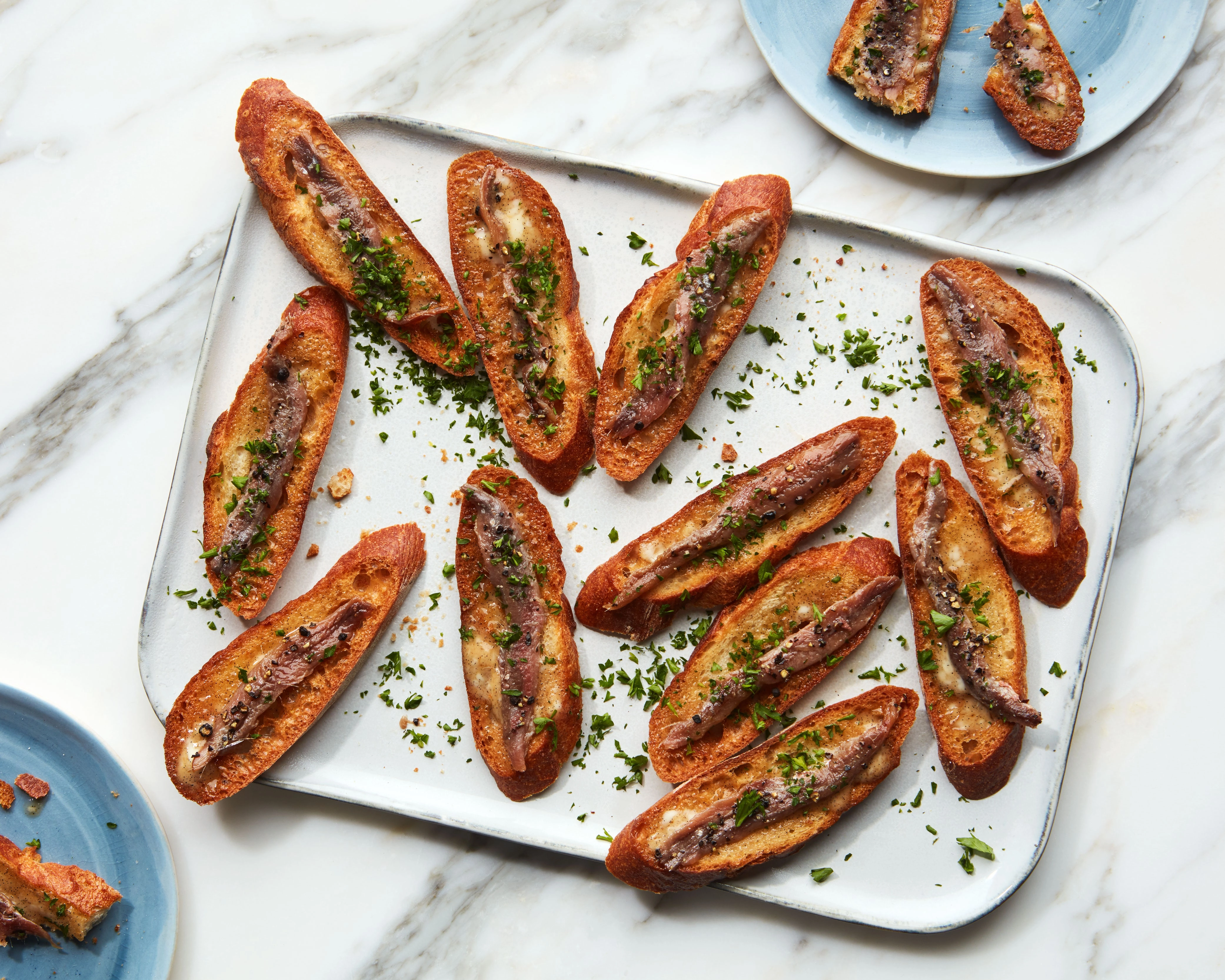 Anchovies And Butter On Mini Toast