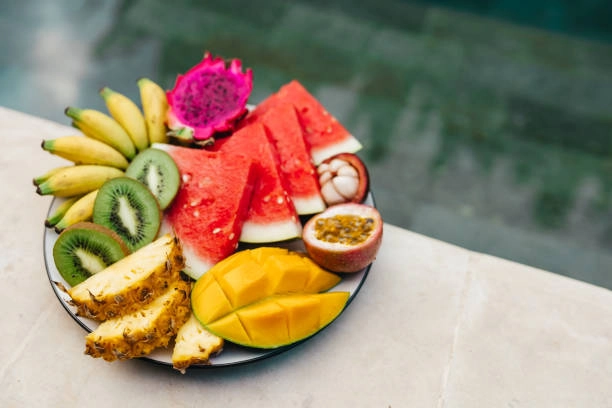 Tropical Fruit Plate With A Berry Compote