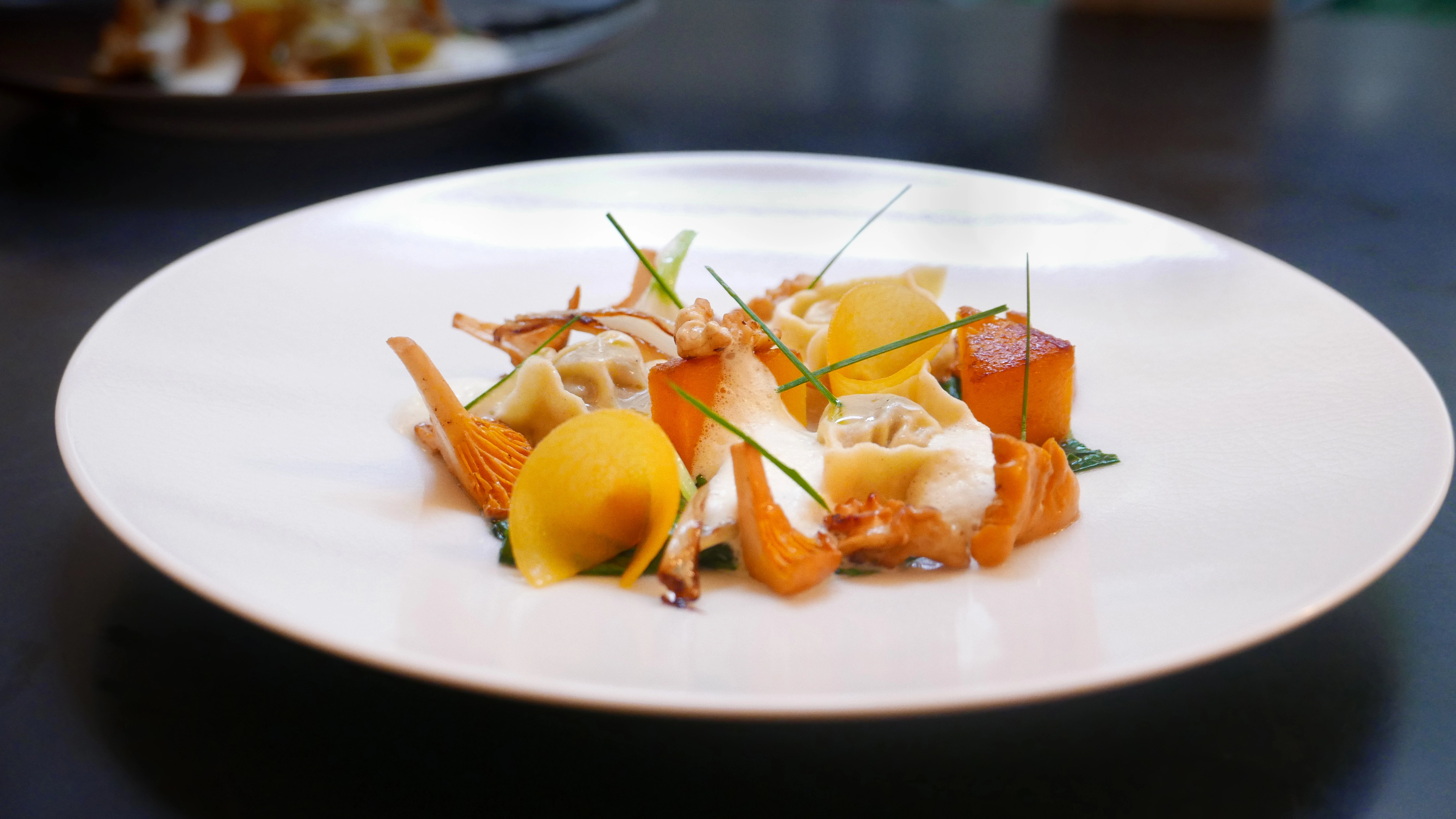 Butternut Squash Agnolotti, Fresh Walnuts, Wild Mushrooms And An Amaretto Butternut Squash Broth (V)