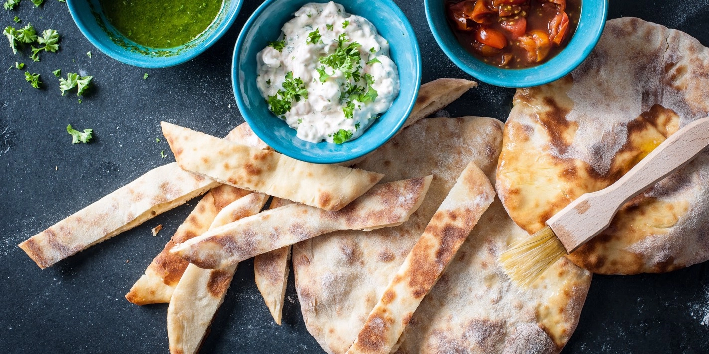 Selection Of Homemade Flatbreads, Tzatziki, Olive Tapenade And Hummus (V)